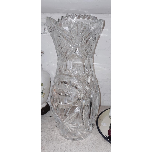 552 - A large baluster cut glass vase, ht. 39cm