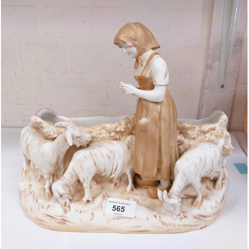 565 - A Royal Vienna group, girl and goats (slight a.f); 3 ceramic wine funnels; a 19th century loving cup... 