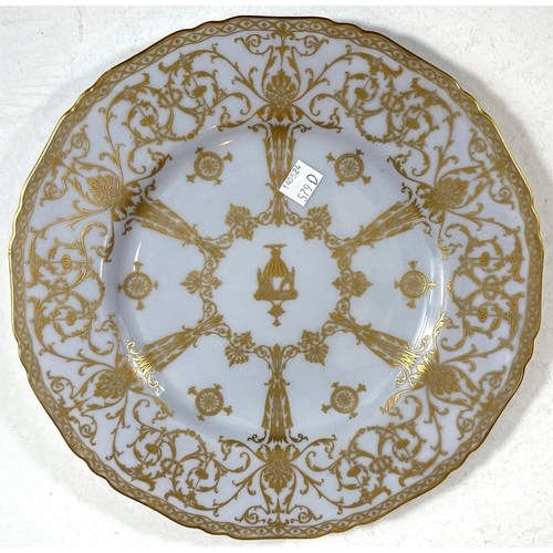 579D - A Royal Worcester gilt decorated dessert plate, a davenport plate blue and gilt with jewelled border... 