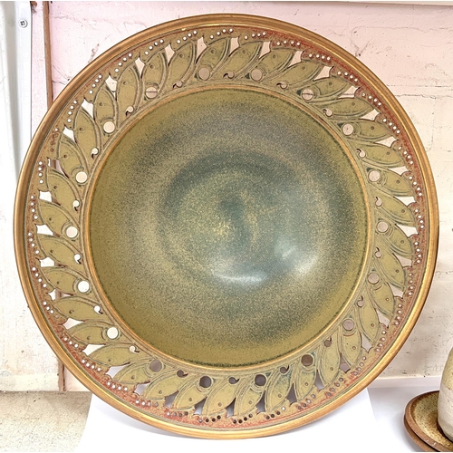 596 - A selection of studio pottery inc. a large dish with pierced rim signed Martin Homer, dia. 41cm, a c... 