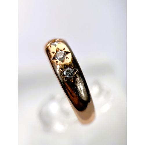 616 - An Edwardian 9 ct rose gold gypsy ring set with 3 diamonds, 4.5gm, size N