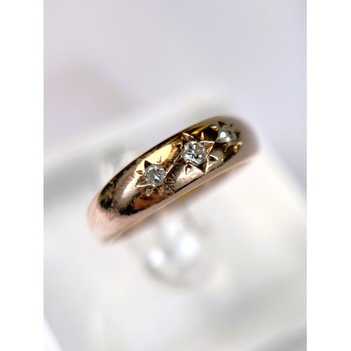 616 - An Edwardian 9 ct rose gold gypsy ring set with 3 diamonds, 4.5gm, size N