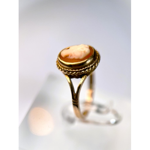 619 - A 9 carat hallmarked gold female head cameo set ring, 3 gm, size M