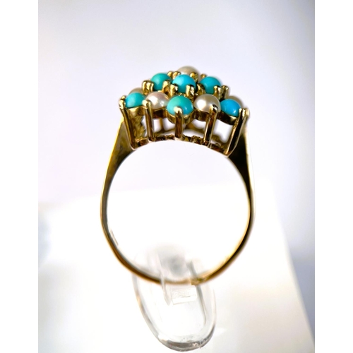 620 - A 9 carat hallmarked gold ring with seed pearls and turquoise in tiered setting, 3.4gm, size N/O