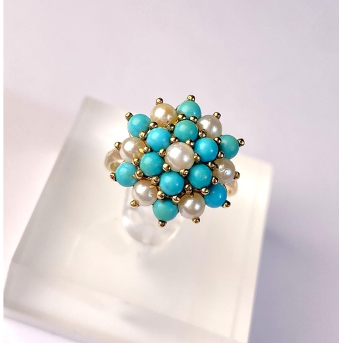 620 - A 9 carat hallmarked gold ring with seed pearls and turquoise in tiered setting, 3.4gm, size N/O