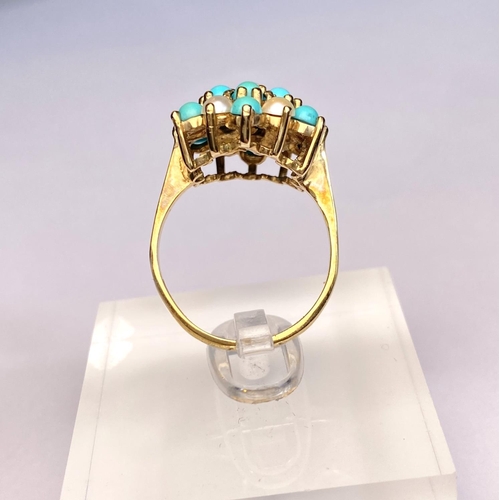 620 - A 9 carat hallmarked gold ring with seed pearls and turquoise in tiered setting, 3.4gm, size N/O