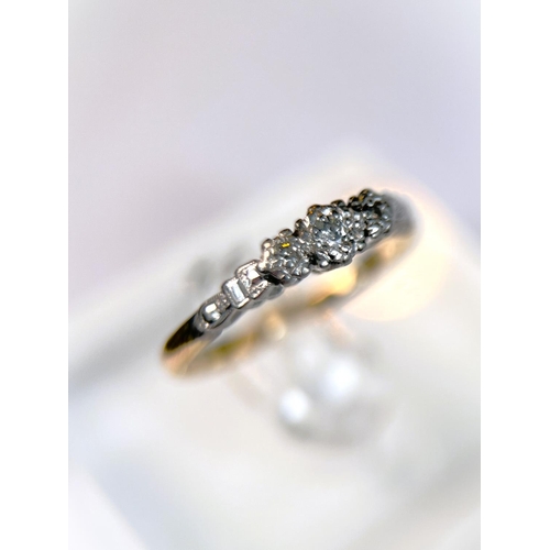 624 - An 18 carat hallmarked gold dress ring with 3 illusion set diamonds in platinum surround, 2.5gm, siz... 