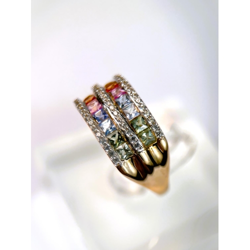 625 - A 9 carat hallmarked dress ring with 3 bands of clear stones and 2 bands of rainbow coloured stones,... 