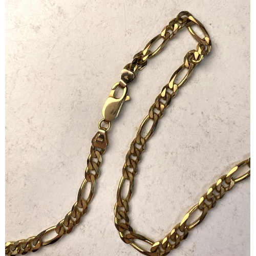 628 - A yellow metal flattened curb link chain stamped 375 Italy, length 60cm, 21.6gm