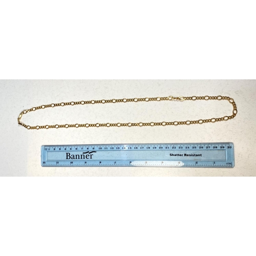 629 - A yellow metal flattened curb and oval link chain stamped 375, 23.5gm