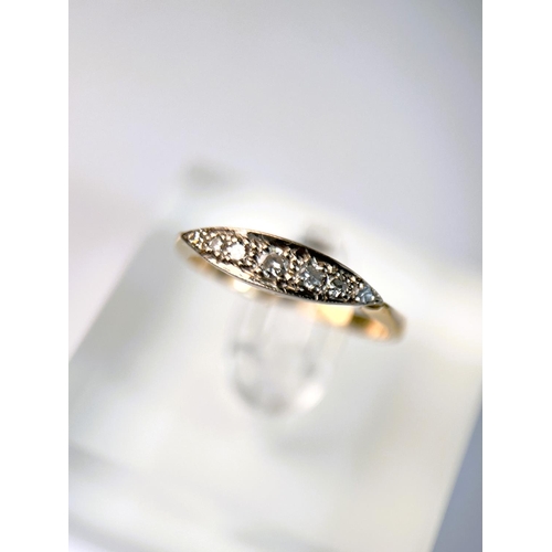 630 - A 9ct hallmarked gold dress ring with offset square with bands of small diamonds and rubies, 2.5gm, ... 