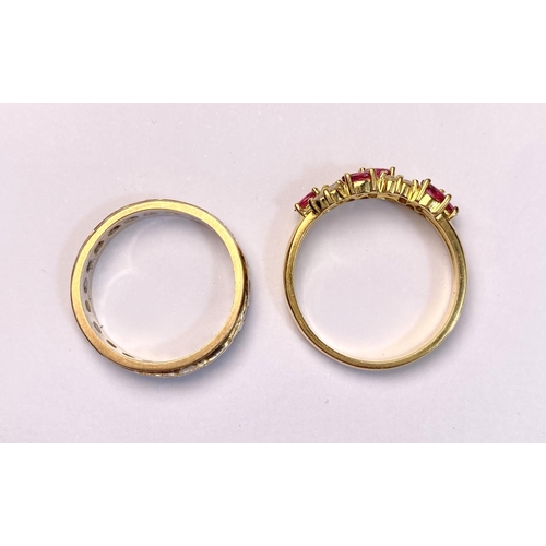 631 - A yellow metal dress ring set with diagonal bands of rubies and diamonds (markes rubbed) 3.9gm, size... 