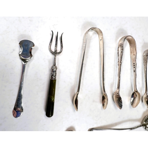 641 - A mixed selection of hallmarked silver teaspoons, sugar tongs etc, 5.3oz