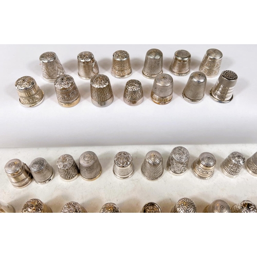 646 - A selection of hallmarked silver thimbles, various dates and assay offices, 7oz.