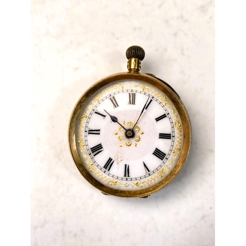 657 - A chased yellow metal open faced keyless fob watch, the outer back case stamped 14K (a.f); a similar... 