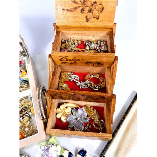 667 - Two jewellery boxes and costume jewellery, a selection of EPNS cutlery