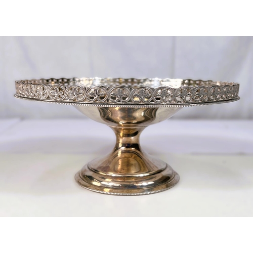 675 - A circular hallmarked silver pedestal cake stand with pierced rim, Birmingham 1933, 16oz, diameter 2... 