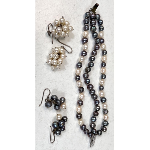 683 - A 3 strand white and grey cultured pearl bracelet, knotted, a similar pair of earrings and another p... 