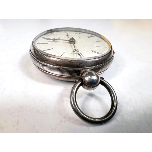 718 - A 19th century open faced key wound hallmarked silver pocket watch, Chester 1852, in overnight stand... 