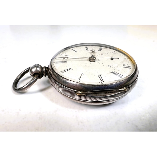 718 - A 19th century open faced key wound hallmarked silver pocket watch, Chester 1852, in overnight stand... 