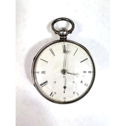 718 - A 19th century open faced key wound hallmarked silver pocket watch, Chester 1852, in overnight stand... 