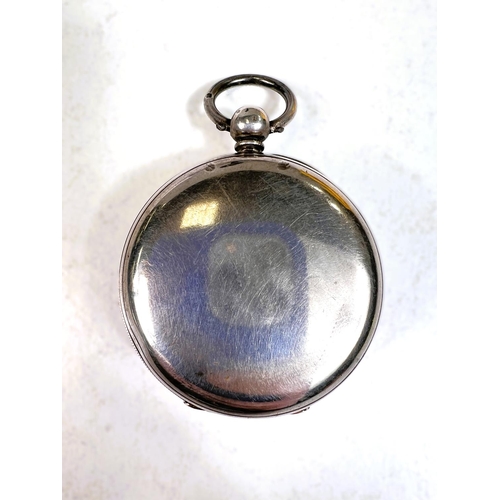 718 - A 19th century open faced key wound hallmarked silver pocket watch, Chester 1852, in overnight stand... 