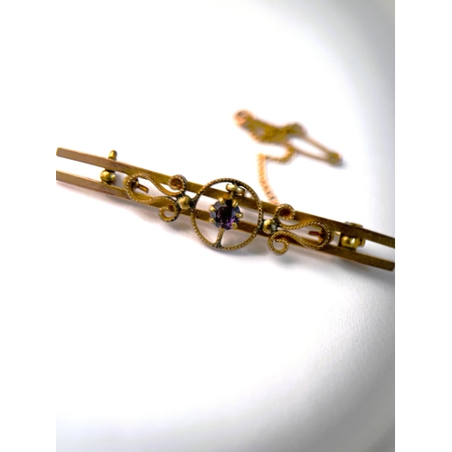 773 - Amethyst set bar brooch with filigree decoration (unmarked)