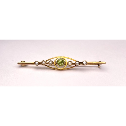 774 - Peridot pearl bar brooch stamped 15, 2.6gm; pair of matching earrings (unmarked) 