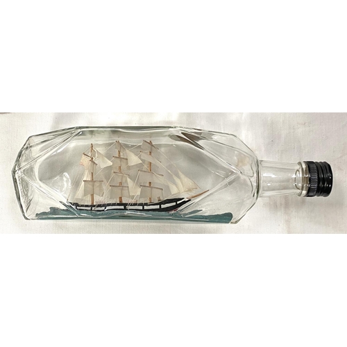 79 - Two silvered metal candle wall lights with waisted glass shade; a similar table lamp; a vintage ship... 