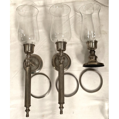 79 - Two silvered metal candle wall lights with waisted glass shade; a similar table lamp; a vintage ship... 