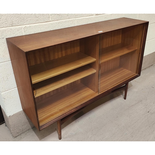 944 - A 1960's G-Plan style teak side cabinet by Dalescraft enclosed by 2 sliding doors