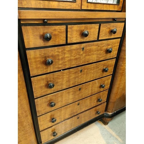 984 - A large early 20th century continental stained walnut reverse breakfront triple wardrobe with eboniz... 