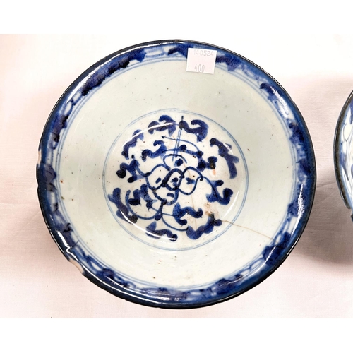 400 - Two Chinese bowls blue and white decoration with seal marks to base (chips to rim)