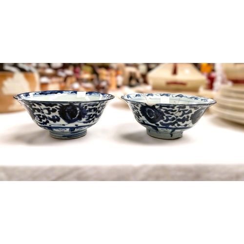 400 - Two Chinese bowls blue and white decoration with seal marks to base (chips to rim)