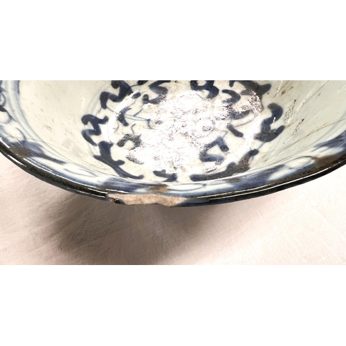 400 - Two Chinese bowls blue and white decoration with seal marks to base (chips to rim)