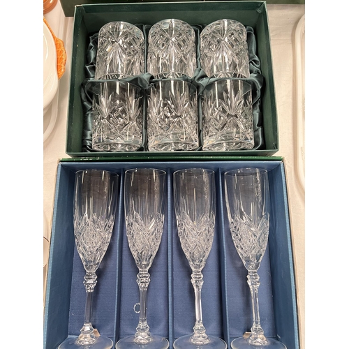 577 - A selection of originally boxed presentation drinking glasses