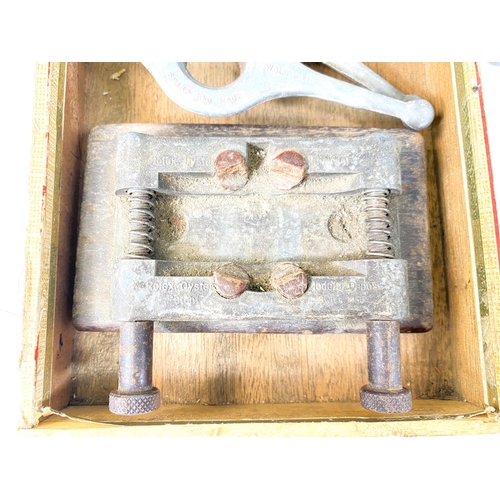 754 - Three Rolex Oyster case back openers and a vice