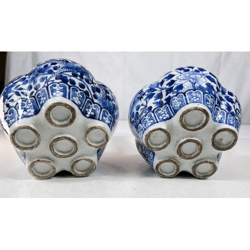 424 - A pair of 19th century Chinese tulip or crocus vases blue and white decoration, with tapering neck a... 