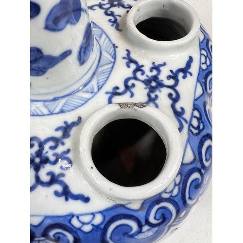 424 - A pair of 19th century Chinese tulip or crocus vases blue and white decoration, with tapering neck a... 