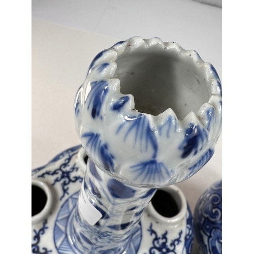 424 - A pair of 19th century Chinese tulip or crocus vases blue and white decoration, with tapering neck a... 