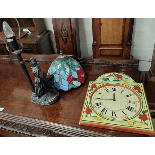 124 - A Tiffany lamp and a painted dial wall clock