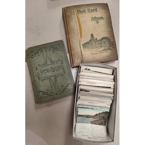 181 - Two early 20th century albums of postcards mix of actors and views and later album plus a box of mix... 