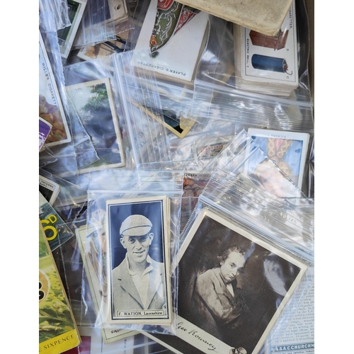 248 - A collection of separately bagged early 20th century cigarette cards, various series including crick... 