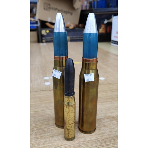 301 - Two post WWII 30mm brass cased shells, 26cm length and a 1944 K2 20mm round