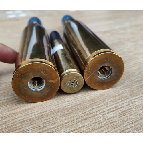 301 - Two post WWII 30mm brass cased shells, 26cm length and a 1944 K2 20mm round