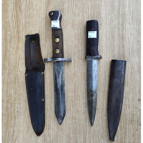 306 - A late 19th / early 20th century field bayonet knife, broad arrow marks and a similar German bayonet... 