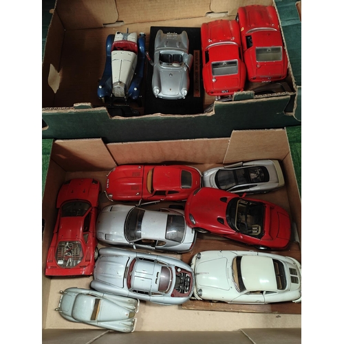 341 - A collection of Burago and other 1/18 scale metal car models