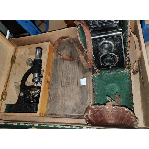 91 - A Roliflex type camera; a students microscope; a boxed micrometer, opera glasses etc