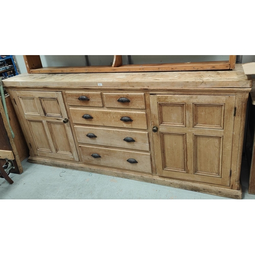 933 - A large Victorian pine Welsh dresser with enclosed cupboard with 5 drawers and matched delft rack to... 