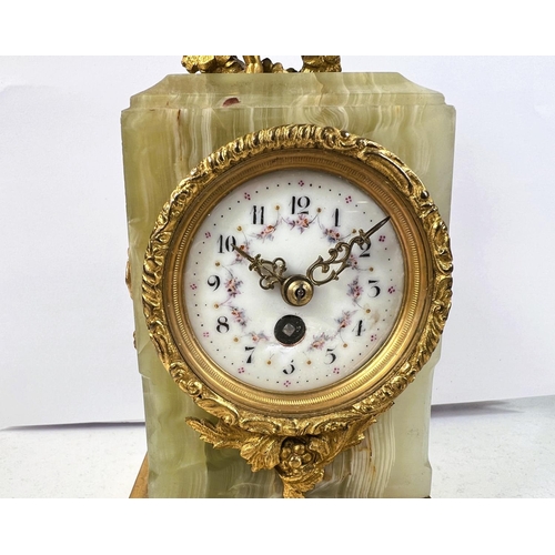 121 - A 19th century French Ormolu mantel clock with gilt cherub decoration